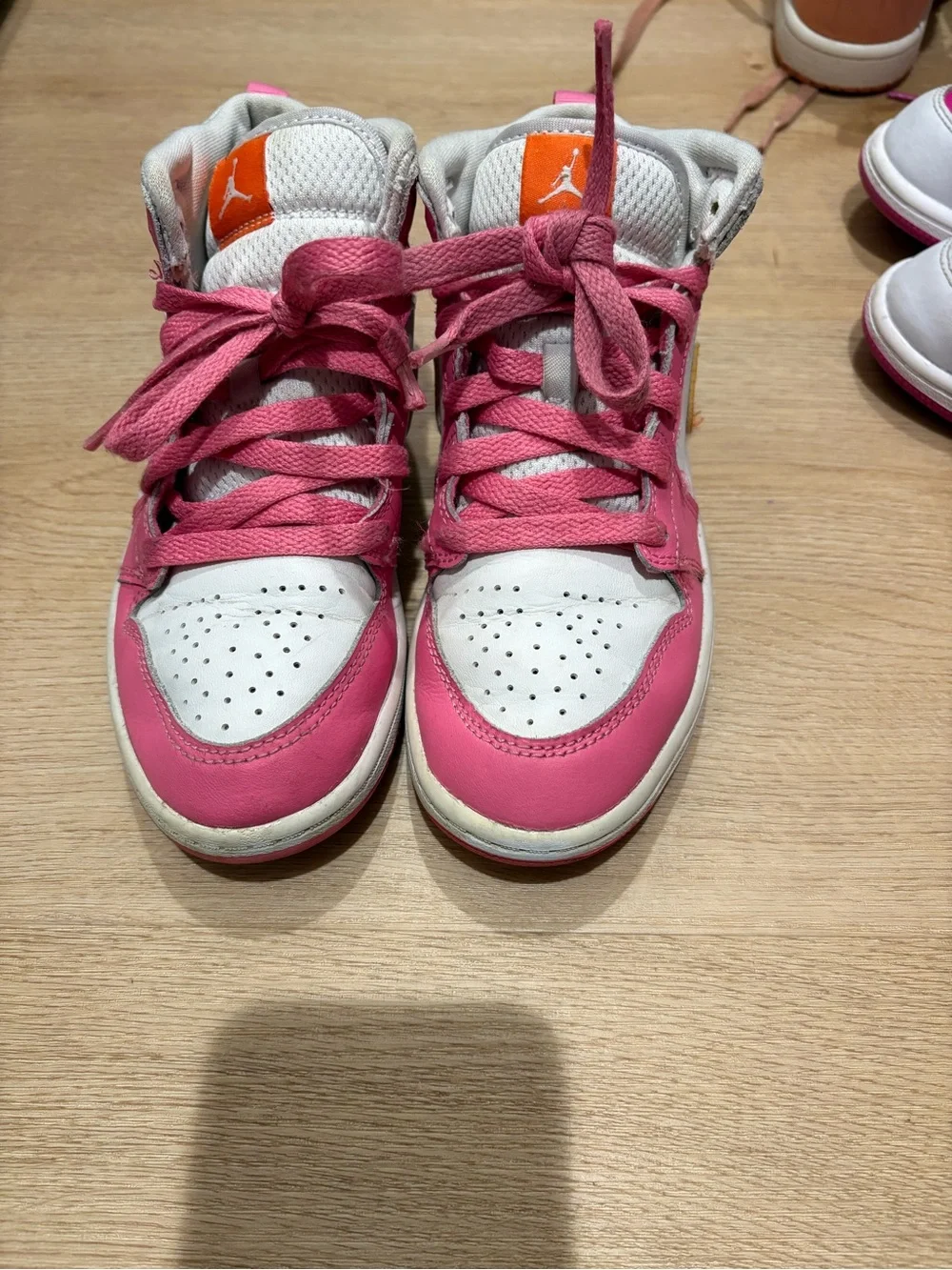 Nike Kids Pink and White High-Top Sneakers with Orange Logo